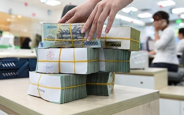 Đẩy mạnh tín dụng, hạn chế nợ xấu: Mục tiêu kép của ngành ngân hàng